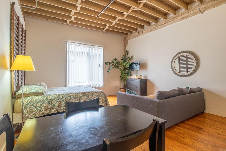 AVAILABLE FOR THE FIRST TIME! Step into the vibrant energy of downtown living with this rare opportunity to own a piece of Little Rock’s industrial and architectural legacy. Located in the iconic Tuf Nut Lofts—formerly home to the legendary blue jean factory. Now officially listed on the National Historic Register, the building showcases post and beam construction, soaring 15-foot ceilings, and exposed brick walls that echo its storied past. This Studio Units have exceptionally rare Birdseye maple floors—a stunning feature so unique, it inspired the building’s current owner to invest in the property.  Inside, enjoy rich wood flooring, an efficient kitchen setup, with appliances included. This unit is fully furnished, making it ideal for investors or turnkey buyers. The second-floor condos also share brand-new washers and dryers. The building offers secure, controlled access, garage parking, and is pet-friendly. Located just steps from a gourmet liquor store and grocery store, and within unbeatable walking distance to the River Market, River Trail, local gyms, parks, restaurants, and more, this loft delivers on location, lifestyle, and legacy.