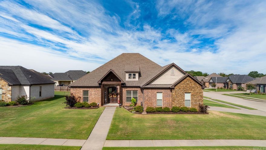 Beautiful 4 bedroom home on spacious corner lot with custom features. Wrought iron fencing encloses a portion of the backyard for small children or animals but leaves the open feeling when outside. Designed with maximum use of space in mind, this home features an open concept layout that seamlessly connects the living room, kitchen, and dining area perfect for both everyday living and entertaining. The kitchen boasts high end custom cabinetry, a breakfast bar, and elegant extra molding details that add a touch of sophistication. Luxury vinyl plank flooring runs the throughout the home with tile in all the wet areas for both beauty and durability. Each bedroom is generously sized offering ample space and comfort.Don't miss the opprotunity to own this stylish, functional and beautifully maintained home.