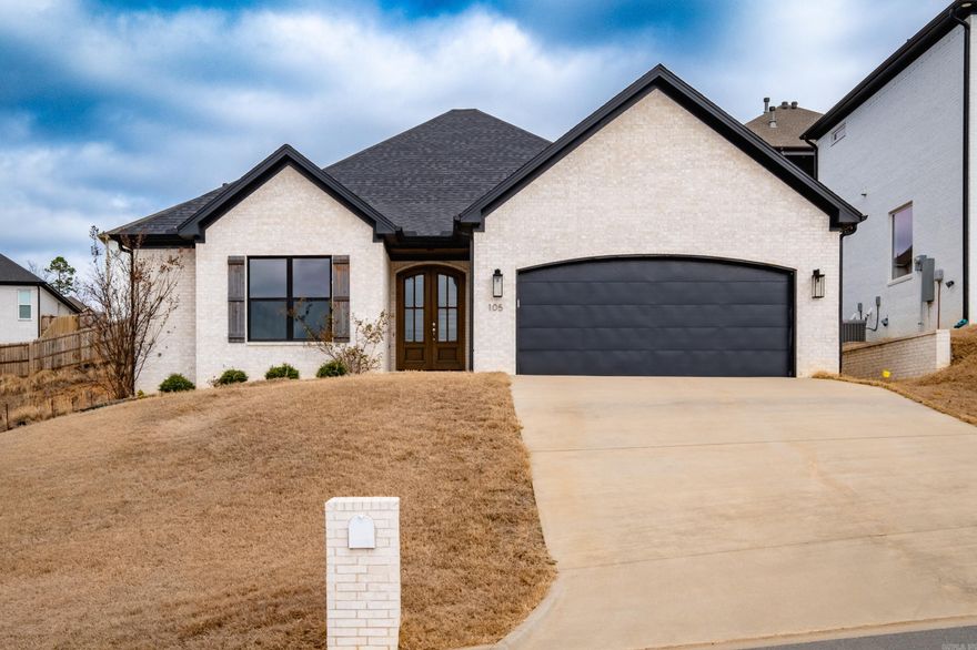 Beautiful one level home built in 2021 and ideally situated on a quiet cul-de-sac in Maumelle Valley Estates Subdivision. This thoughtfully designed three bedroom, two bathroom home offers modern finishes, functional space and comfortable living throughout. The kitchen features quartz countertops, a gas cooktop, wall oven, large walk-in pantry and an open layout perfect for every day living and entertaining. A spacious laundry room adds convenience, while the tankless water heater provides energy efficiency. The primary suite is separated from the guest bedrooms and includes a large walk-in closet with built ins, relaxing soaker tub, a walk-in shower, and a private water closet. Two guest bedrooms share a hall bath. Enjoy outdoor living on the covered back patio, already wired and plumbed for gas grill and television - ideal for entertaining. Welcoming double front doors open to a large entryway, creating a beautiful first impression. Two car garage with keypad. Partial views of Pinnacle Mountain from the front of house. Optional access to Maumelle poos and fitness center. Come see!