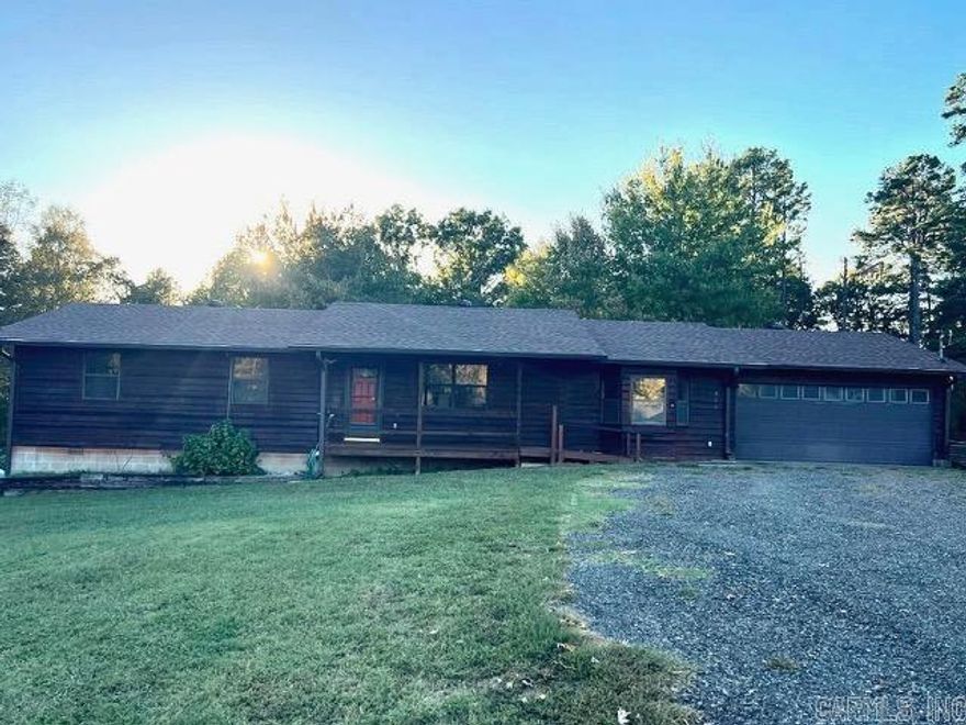 Lovely 3 or 4 bedroom 2 bath home on over an acre of land with 2 outbuildings, storm shelter, garden spots, new roof, new paint and close to the beautiful Greers Ferry Lake and all the fun that comes with the scenic surrounding area.  This home is near the end of the lane with very little through traffic.  Don't let this wonderful home slip away.  Call today to set up a viewing.