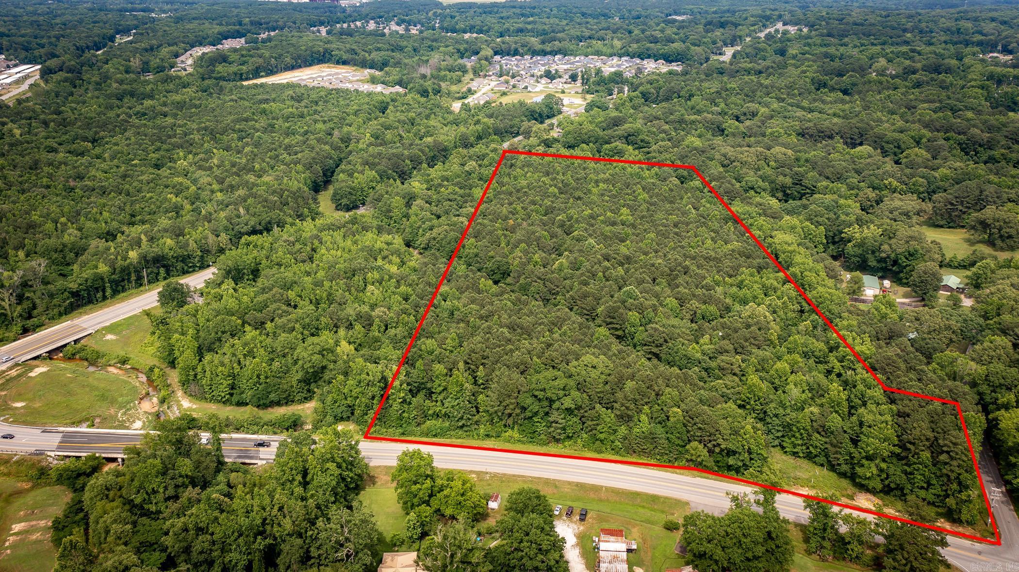 Strategically located Highway Commercial land, prime for development. 16 minutes from new Gateway Town Center and Bass Pro. About 800 feet of frontage on Hwy 35, about 100 feet of frontage on Hwy 183, and about 200 feet of frontage on Silica Heights which provide high visibility. All utilities available. Zoned C-4, Great Great High Visibility property in downtown Benton. Perfect for a shopping center, a self-storage facility, a distribution warehouse, or any commercial use.