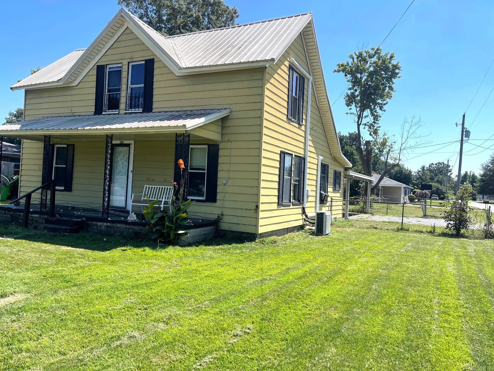 This old world charm sits on a corner lot. Yard is partially fenced in. It's being sold as is, allowing you to add your personal touch.