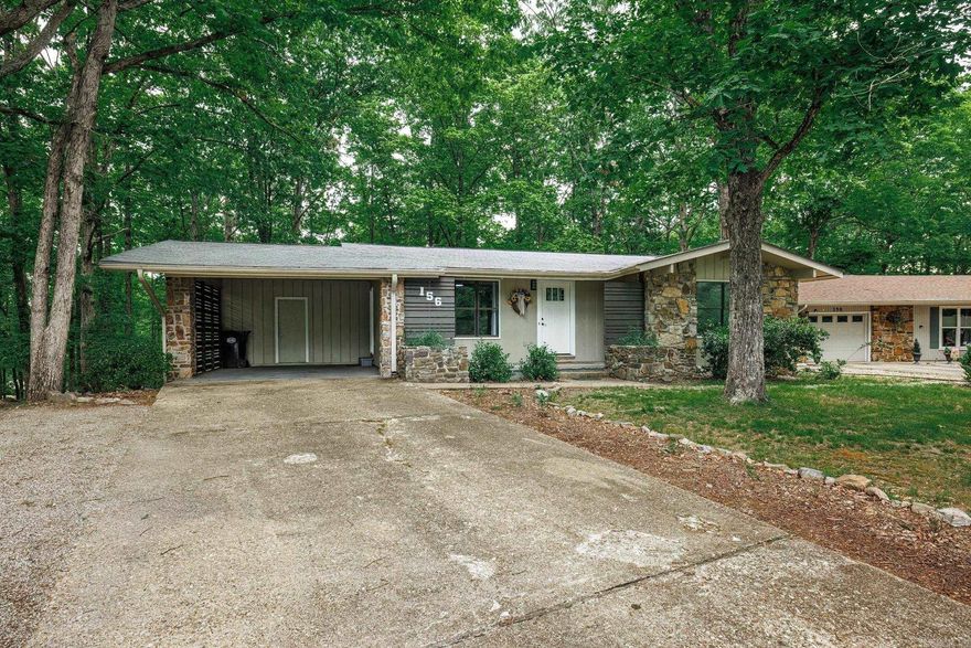 Wonderfully updated home with two bedrooms, two baths and a flat driveway! Updates include removed popcorn ceiling, mud and texture interior paint, trim, base boards, crown moulding, wainscoting, added detail to interior doors and added barn doors. Kitchen butcher block counters with a waterfall edge, painted cabinets, new hardware, appliances 1 1/2- 2 years old, sink, faucet, lighting and added hutch area. Bathrooms have new high toilets, vanities, sinks and faucets, lighting, shower pan and showers. LVP flooring. Ceiling fans and additional lighting. New front door and carport door. Created a utility room with extra space for pantry storage. Don't miss the extra storage room in the carport. There is nothing left for you to do! Extra parking pad with POA approval. Love and care in every room just waiting for the new owner to enjoy. Art work, mirror and decor is for staging and does not convey. Roof 2021. HWH 2022. Heat pump 2021. Documents for Stone Appraisal measurements. Agent remarks.