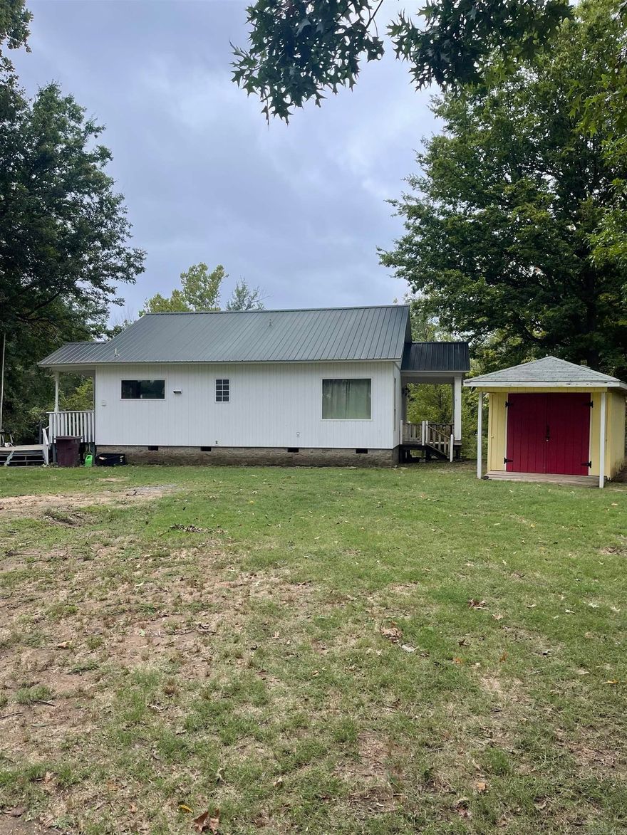 Peaceful setting on the Arkansas River. Built in 2008, this home features: newer paint, newer water heater, refinished hardwood floors, bathroom and kitchen remodeled, tons of windows and a beautiful deck to enjoy the view of the river. Property also features 2 outside storage buildings and a metal roof. Call today for your appointment to see this one! Located in a Rural Development Area for possible $0 down!