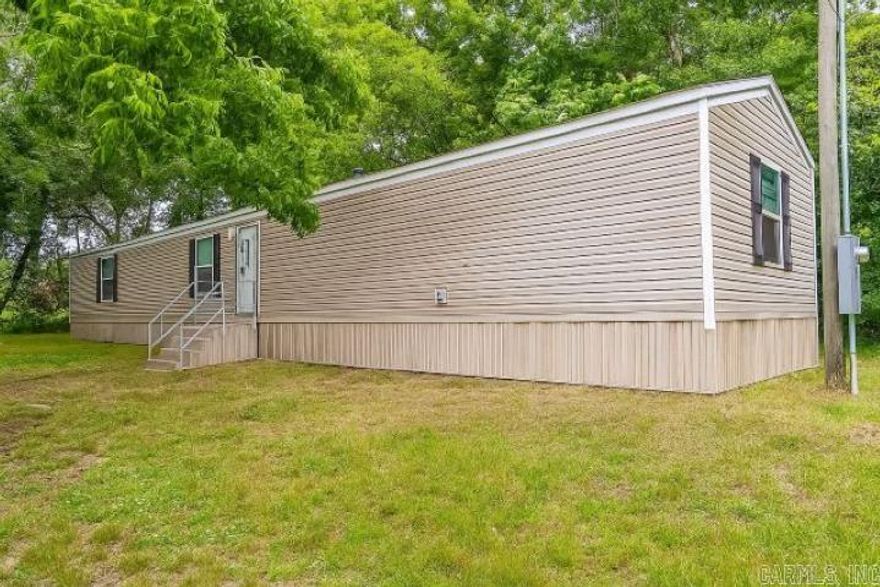 3 bd 2 bath single wide with new flooring & paint.