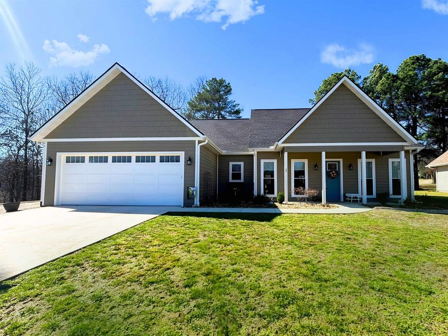 A rare opportunity to own a 2024 custom home overlooking the #12 tee box of the South Golf Course. Thoughtfully designed with no stairs, refined architectural details, & a seamless indoor–outdoor flow, this property delivers modern comfort & timeless craftsmanship.  Kitchen boasts custom cabinetry (6 glass display cabinets), self-closing drawers & doors, large Kraus bowl sink w/garbage disposal, and stainless steel appliances (gas range, refrigerator, microwave, & dishwasher). Also a spacious walk-in pantry w/window, frosted glass door, built-in broom closet & shelving, & coffee bar w/cabinetry. Plus comfortable dining area off the kitchen. Master bedroom features cove ceiling; Hunter fan, carpeting, & large walk-in closet. En-suite bath offers double vanity w/onyx countertops, custom cabinetry, linen storage, 2 recessed medicine cabinets, and 5' walk-in onyx shower w/both wall & rain shower heads. Two additional rooms may serve as guest or office spaces. Guest bathroom offers custom cabinetry, quartz countertops, tub/shower combo. Laundry room has a washer & dryer, mini-fridge, chest freezer, built-in shelving, & cabinets. AND SO MUCH MORE!!! Call to make your appointment Today.