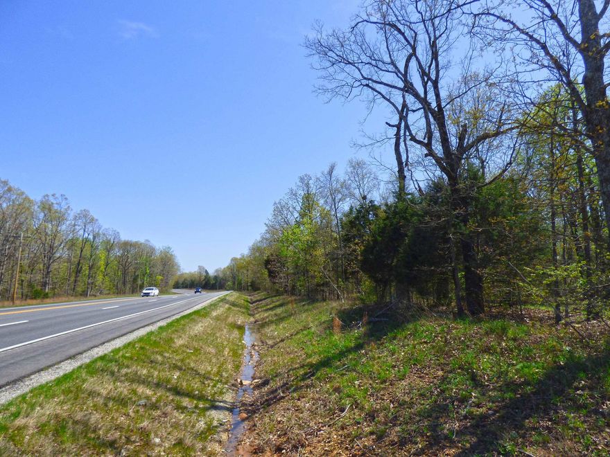107 Acres of Undeveloped Land with So Much Potential! Has unlimited investment possibilities! Fronts US Highway 63, 62/412 which is high traffic/visibility and bordered by 2 county roads. Great location for an RV Park, subdivide for homesites or to sell off parcels. This land is mostly wooded with plenty of Deer & Turkey for hunting. Easy to get to from Jonesboro or Hardy.