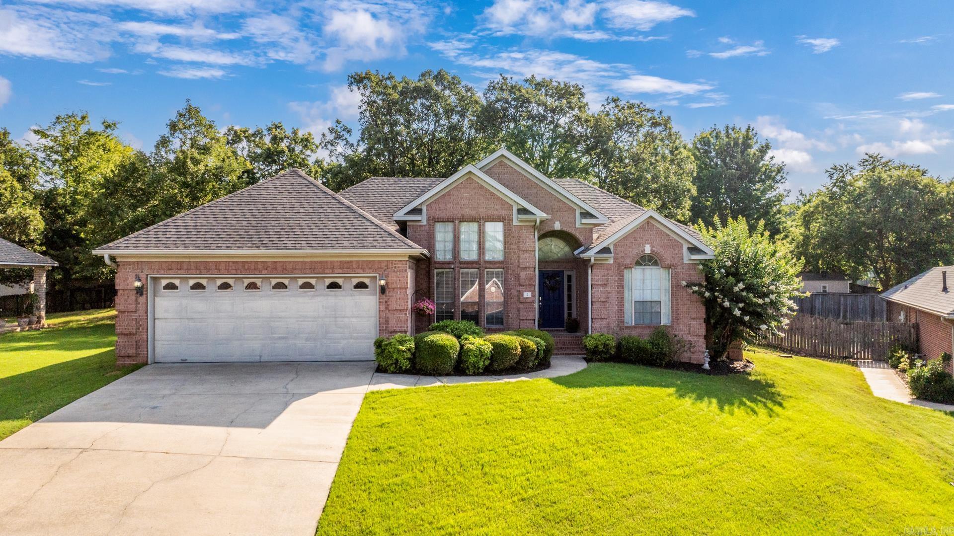 One-level home tucked away on a quiet cul-de-sac in Maumelle Valley Estates. The spacious great room features wood floors and a gas-starter fireplace, creating a warm, inviting space for gatherings. A formal dining room with tall ceilings and a wall of windows brings in tons of natural lightācurrently used as a music room but ideal as a sitting room or home office. The large kitchen offers granite tile countertops, Large breakfast area, an island, breakfast bar, and ample cabinetry for storage and prep. The primary suite features a trey ceiling, and includes a separate office or flex space perfect for a nursery or cozy reading nook. The en suite bath includes a double vanity, jetted tub, and separate shower. Enjoy the fully fenced backyard with a patioāgreat for outdoor relaxation or entertaining. Convenient Maumelle location with neighborhood charm.