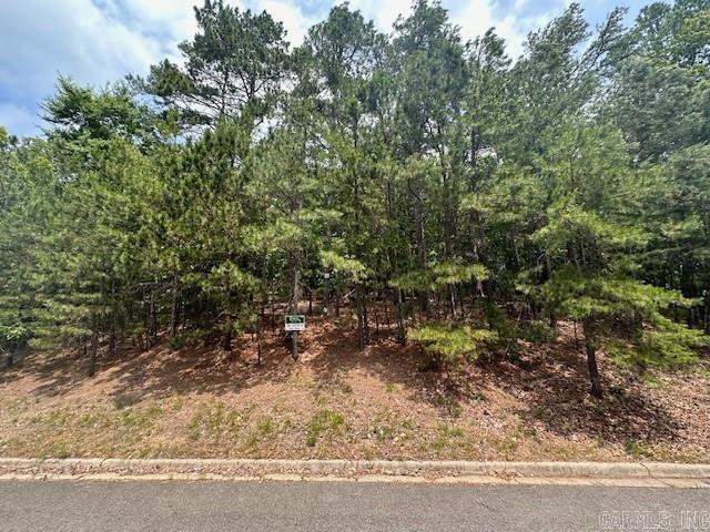 GREAT BUILDING SITE IN THE PREMIER GATED COMMUNITY OF HOT SPRINGS - RED OAK RIDGE . SITUATED ON 800 ACRES. ENJOY SERENITY AND PEACEFULNESS WITH LAKE AND MOUNTAIN VIEWS WITH SOME OF THE LOTS. PAVED WALKING PATHS ALONG THE LAKE FRONTS OF THE TWO PRIVATE RED OAK RIDGE SPRING FED LAKES - STOCKED WITH BASS FOR FISHING - ALONG WITH SMALL BOATING ACTIVITIES. ENJOY MOTHER NATURE AT ITS BEST! GREAT LOCATION CLOSE TO ACTIVITIES!!