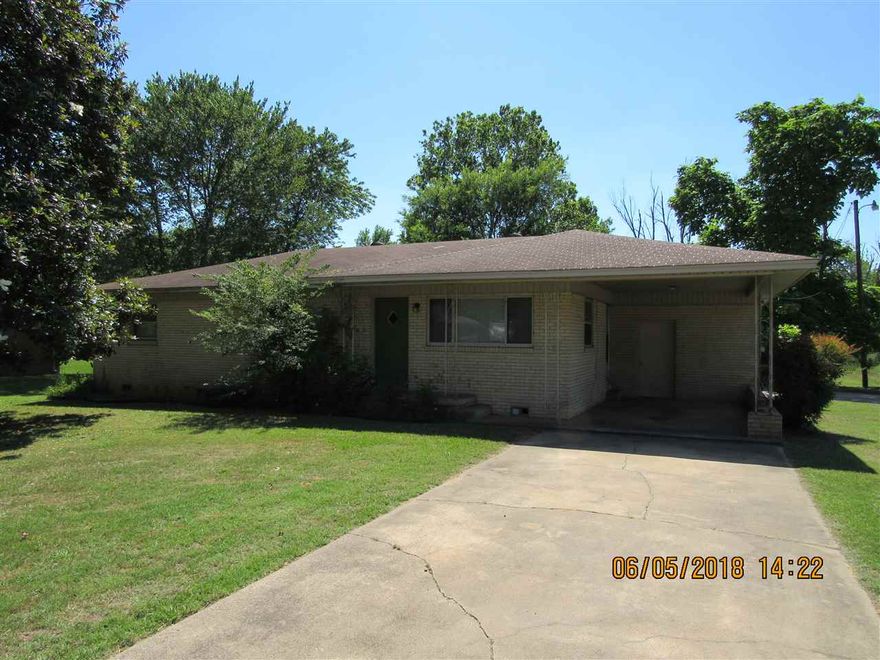 Well maintained older 3 bedroom home on oversized lot, wood floors, all kitchen appliances including refrigerator, separate dining area with built-ins, 1 car carport with attached storage room, large open patio, No college students. No Pets.