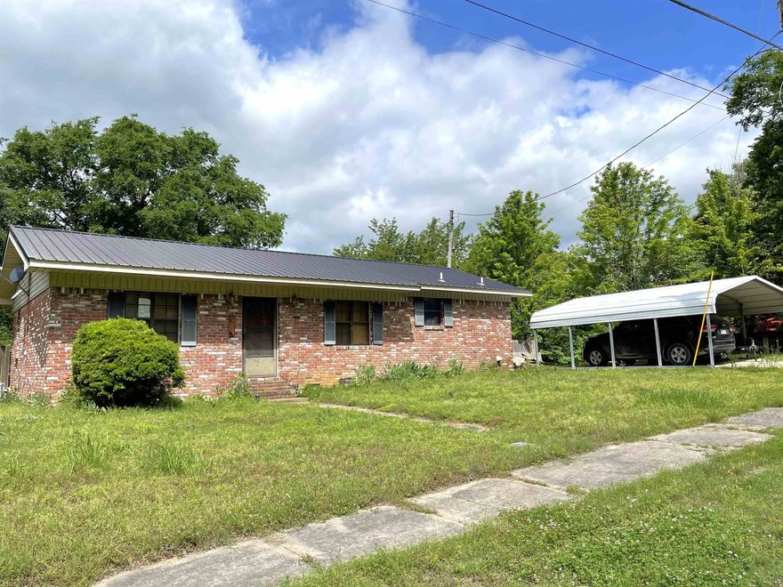 2 bedroom, 2 bath, brick home with newer roof, privacy fenced backyard, above ground pool that has a newer liner and new sand filter and pump, storage building, portable carport, and a bonus room that could be a sunroom, craftroom, or extra bedroom!