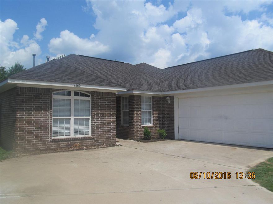 Totally redone on the inside! All new flooring and paint throughout, granite countertops in the kitchen, stainless appliances in the kitchen, comes equipped with all major appliances including refrigerator, washer & dryer, split bedroom plan, 2 inch blinds throughout, separate jet tub & shower in master bath, fully fenced yard, oversized two car side entry garage with storage room - a must see!  **If a one year lease is signed before 12/31/2017, rent will be $1,075 per month.**