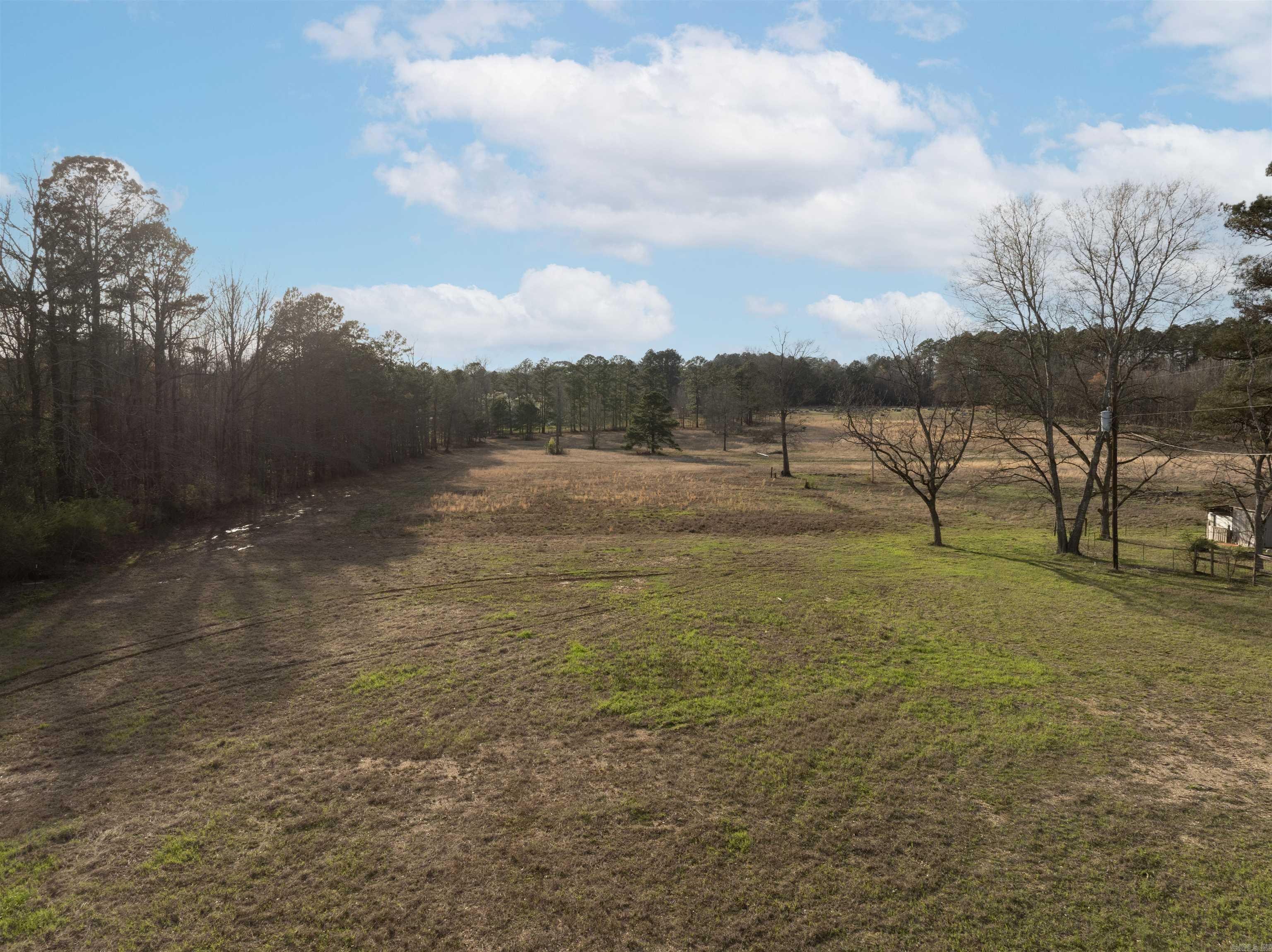 Welcome to this beautiful 12+ acres of land in Saline County ready for your new HOME! Rolling hills, large mature trees, and open pasture make this an amazing spot to call home. Property has existing utilities available as well as plenty of road frontage. Less than 15 minutes to downtown Benton and 5 minutes to Haskell this property is just minutes from all your necessary amenities. Contact us today to view this piece of paradise! BOMK at no fault of seller