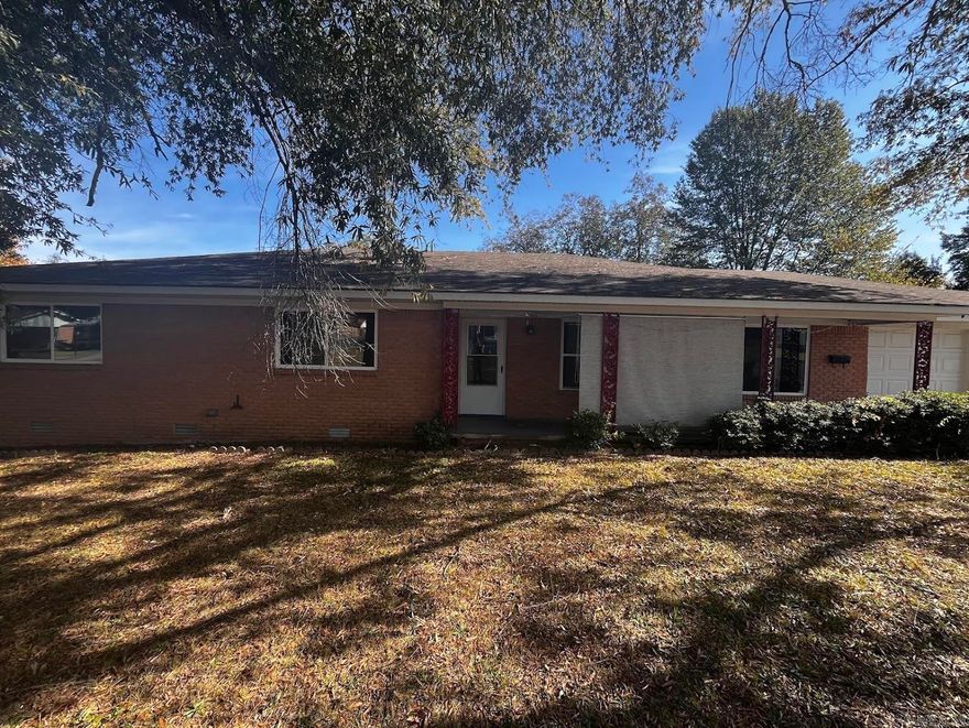 Discover comfort and convenience in this charming 3-bedroom, 2-bath home located in the heart of Hot Springs! Perfectly positioned close to everything—schools, dining, shopping, and Oaklawn—you’ll love the easy access to all the city has to offer. Inside, the inviting layout offers plenty of space, while outside features include an attached 2-car garage, a welcoming front porch, and a spacious back patio ideal for relaxing or entertaining. The flat backyard provides ample room to enjoy, complete with a handy storage shed. Whether you're looking for your next home or a smart investment opportunity, this property checks all the boxes! No seller property disclosure available. Showings require 24 hours notice.