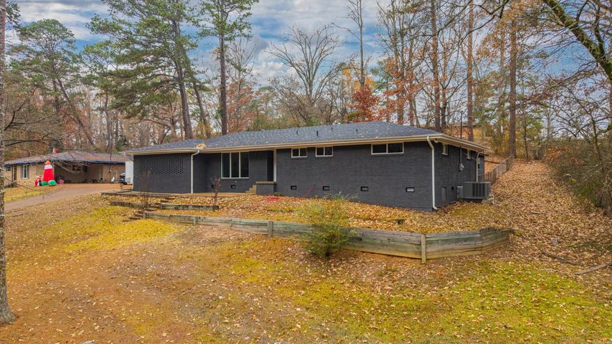 1952 SQ FT Updated Brick Beauty  Step into this stunning 1,952 sq ft brick home, thoughtfully updated throughout and move-in ready! Sitting high on a hill with a wooded view across the street, this property delivers charm, comfort, and modern convenience.  Highlights Include: Brand-new flooring throughout New energy-efficient windows bringing in tons of natural light New roof for long-term peace of mind New appliances in the kitchen Custom cabinetry topped with gorgeous granite countertops Updated bathrooms with fresh finishes Solid brick exterior offering timeless curb appeal This beautifully refreshed home combines quality upgrades with a scenic setting — the perfect blend of style and comfort. AGENT OWNED