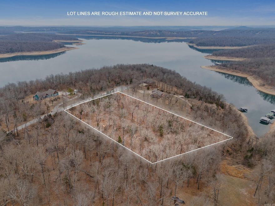 Build your Ozark dream on 1.76 acres m/l in the desirable Belle Cove area of Mountain Home. Located near the end of a quiet cul-de-sac, Lot 20 offers privacy, minimal traffic, and a peaceful setting just minutes from Tracy Ferry Marina. Enjoy a seasonal view of beautiful Lake Norfork and the added bonus of adjoining the Government Strip for additional buffer and natural surroundings. NAEC electric is available, making it easy to start planning your custom home or lake retreat. Whether you're envisioning a full-time residence or a weekend getaway, this property delivers location, convenience, and that coveted lake lifestyle. Just five minutes to launch your boat and spend the day on the water, yet tucked away enough to feel private and serene. Opportunities like this near Lake Norfork are limited — come imagine the possibilities.