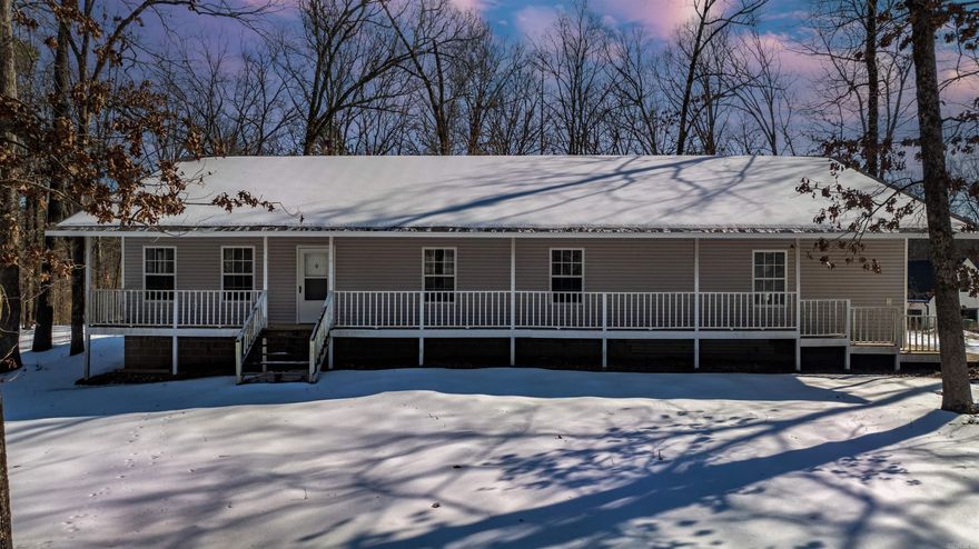 Appraised at $305,000 in September 2025, this property also comes with a $10,000 flexible seller credit that can be used toward closing costs, a rate buy-down, price reduction, or future updates, making this an exceptional value from day one. Set on 3.28 wooded acres, this 3 bedroom, 2 bathroom home offers space, privacy, and a setting that feels tucked away while still being highly accessible. A long, welcoming front porch stretches across the entire front of the home, perfect for morning coffee or evening sunsets, while the garage includes a large workshop area ideal for hobbies, storage, or projects. The home has seen thoughtful 2025 updates, including a brand-new 25-year roof (12/25), $10,000 worth of extensive tree removal and brush clearing, new LVP flooring installed (9/25), and a refreshed kitchen with a new dishwasher, sink, faucet, and disposal. Inside, the layout is functional and inviting, designed for everyday living and entertaining. Outside, the wooded surroundings and peaceful atmosphere create a true sense of country living with great neighbors nearby. Located just five miles from West Little Rock, you enjoy rural tranquility without sacrificing convenience.