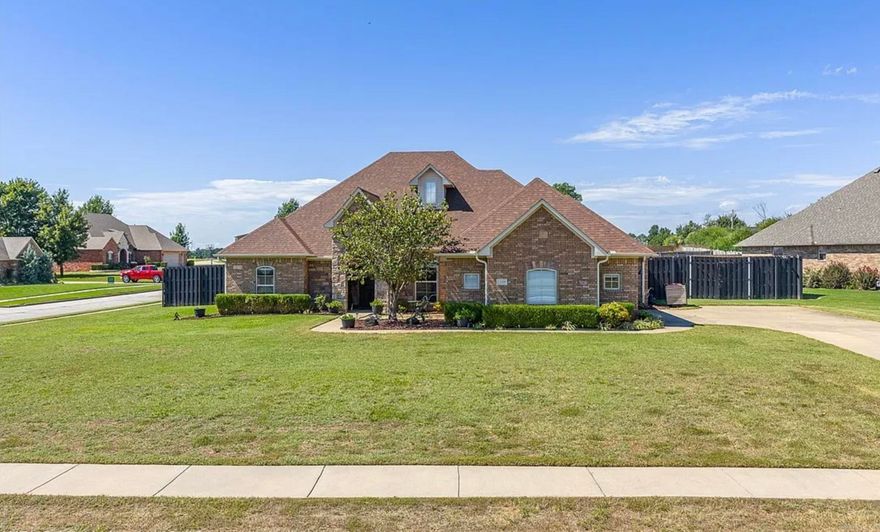 Set in the beautiful Blackstone Ranch community in Fort Smith but within the award-winning Greenwood School District, this home blends modern upgrades with everyday comfort. With 2 living areas and a formal dining room, the layout offers flexibility for gatherings, dinners, or cozy nights at home. Wood floors extend through most of the home, while granite countertops elevate the kitchen, all 3 bathrooms, and the laundry room. The heart of the home is the kitchen, designed for both function and entertaining, featuring a gas stove, double ovens, and new microwave and dishwasher. A generous eat-in space invites casual meals, coffee, or late-night conversations. Fresh paint, updated lighting, ceiling fans, and exterior sconces create a polished, move-in ready feel. Additional highlights include a 3-car garage with insulated doors and shelving, high-efficiency HVAC, wired sound, and security systems. Outdoors, enjoy a pergola, fire pit, raised garden beds, hammock posts, and astro-turf play area. The oversized patio is ideal for entertaining, all within an 8-foot privacy fence. Love where you live in this Blackstone Ranch retreat.