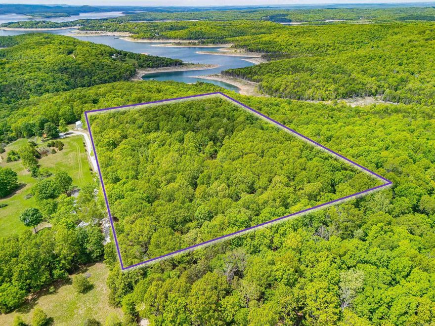 20 beautiful acres with 2 ponds and several areas already cleared for potential building sites.  Property backs up to 88 acres of Corps of Engineers land and could potentially be cleared for a lovely view of Noe Creek off of Bull Shoals Lake.  Sellers are willing to assist buyers in obtaining a Perc Test of the property.