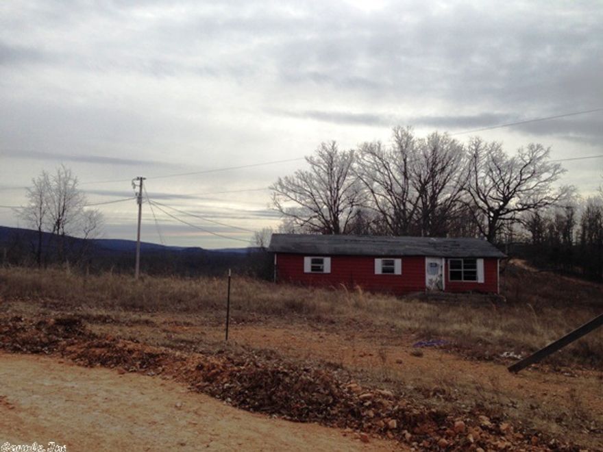 No. 01301 COUNTRY ACREAGE IN MOUNTAIN VIEW ARKANSAS  .83 acres located only 15 minutes from downtown Mountain View the Folk Music Capital of the World. There is a building site on the property for your new dream home, mobile, or RV. Power, water, and DSL are available. 10 minutes away is a boat ramp to the White River for excellent trout fishing. Ozark National Forest, Blanchard Springs Caverns, camping, and swimming only 20 minutes away. Start your dream home today! $6,500.