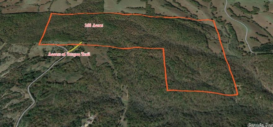 160 Wooded acres Searcy County Arkansas.  Property has old logging road through it.  Power is close by, a well would need to be drilled for water.