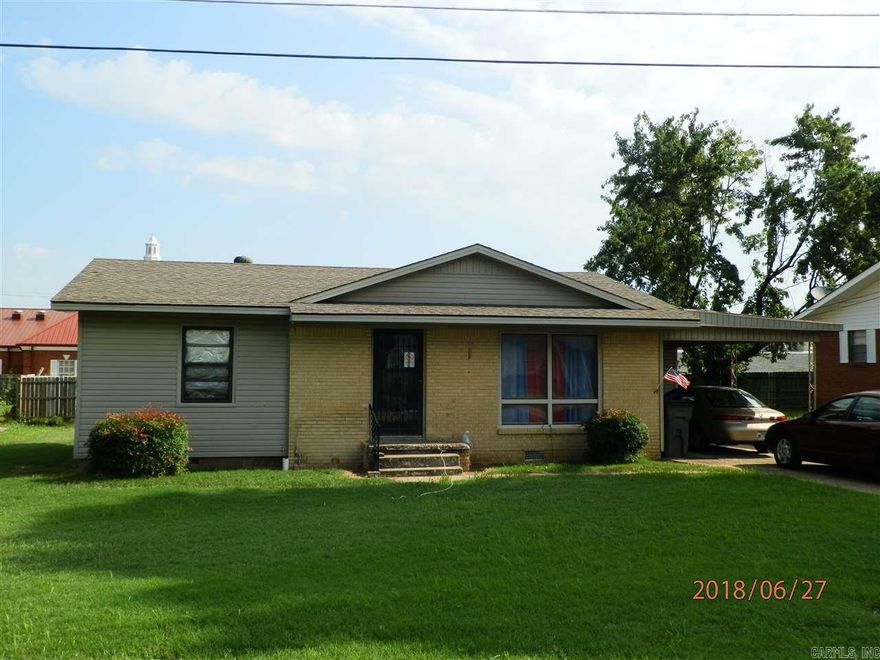 Nice home with one-car carport. Hardwood floors. Tenant pays all utilities. Not a HUD Section 8 rental. No pets allowed. Interested persons may apply and pay application fee with listing office.