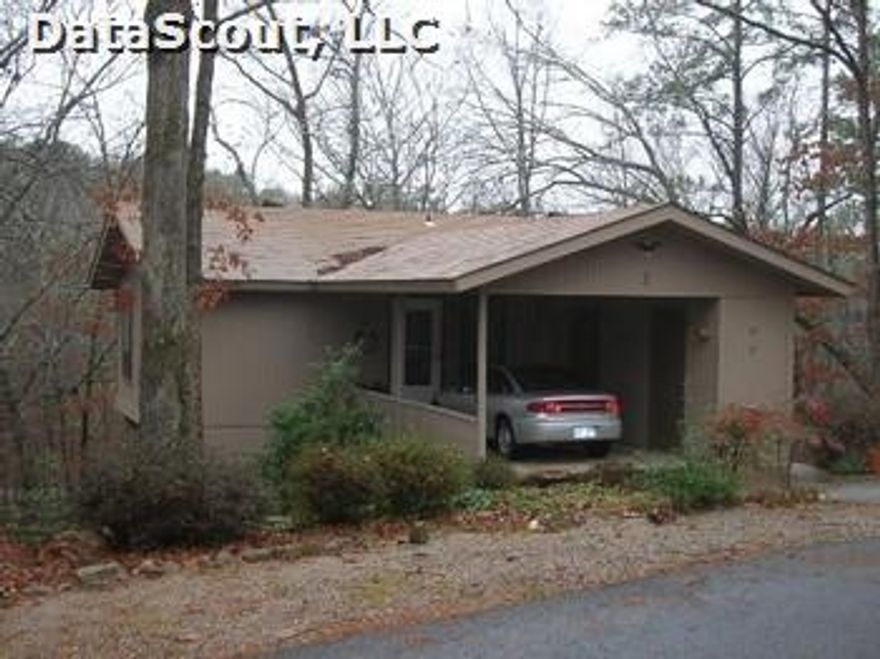 Very clean and neat home. Recently painted inside and out. Heat pump 1 year old. Roof replaced 2008. Private deck with common property behind and to the left. Large carport storage. Washer, dryer and refrigerator negotiable.  Storm windows. NO SELLER DISCLOSURE