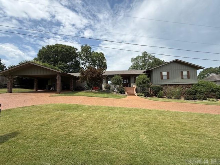 HOW ABOUT A HOME WITH THREE L'S? Luxurious, Lovable, and LIVEABLE! Enjoy the VIEW while living in this quality constructed 4-bedroom, 3.50-bathroom home with over 4200 square feet. LOOK BEYOND THE ORDINARY, a wall of windows makes up the majority of the rear of this BEAUTY! Upon entry you are greeted with a library, dining area and SPACIOUS living room. Designed to ENTERTAIN, the kitchen is perfect for the host who loves to cook and entertain. Need more SPACE? An additional family room offers room to go away without getting away. SUITE RETREAT! 2 primary suites are hard to come by, just another feature that makes this home ONE OF A KIND. Lower level offers a kitchenette, living room, bedroom and bath.  Professional landscaping, multi-teared deck overlooking the White River and rolling lawn make this the PERFECT place for peaceful RELAXATION! To preview this home, call TODAY!