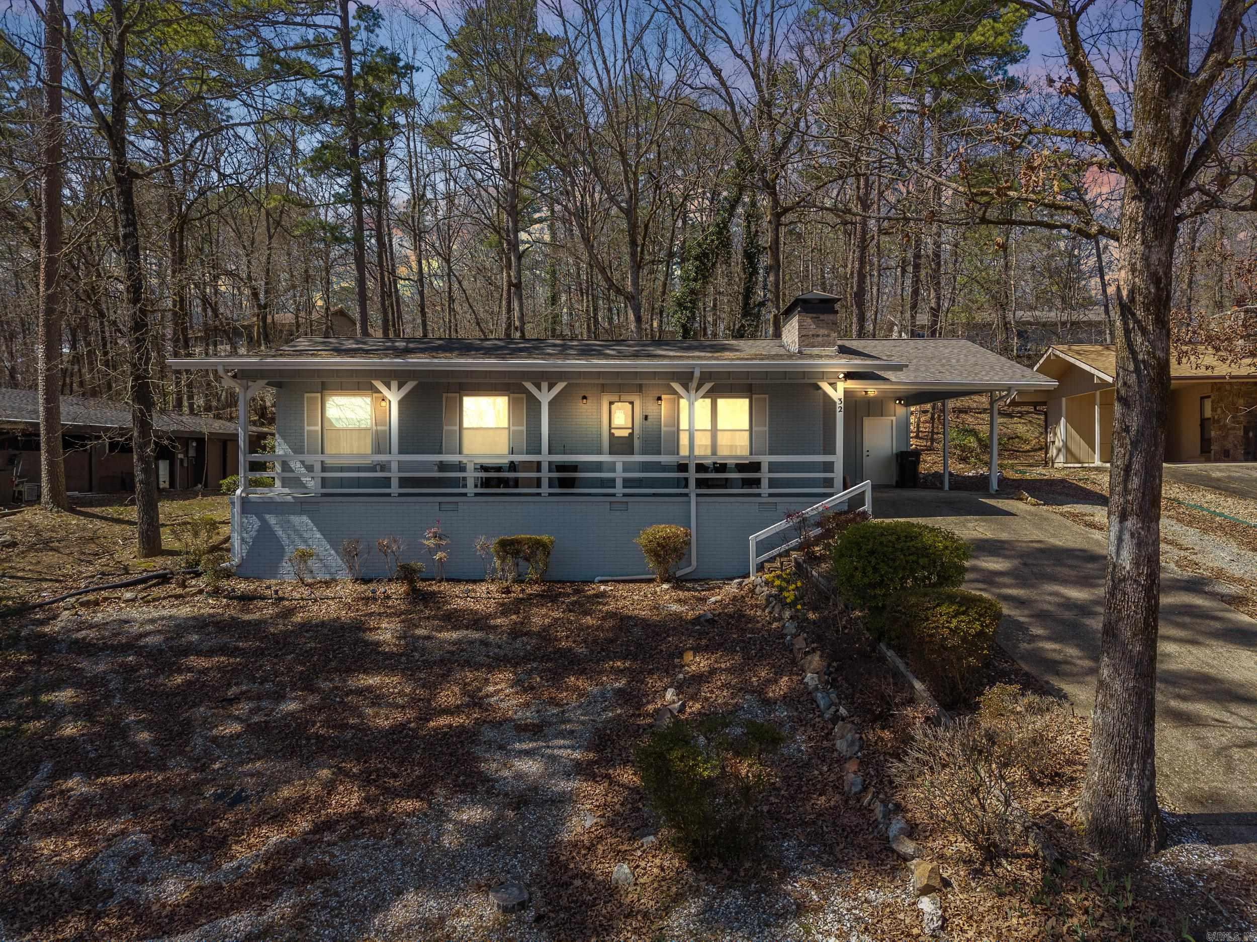 Motivated Seller, bring your offer! This recently remodeled, 3-bedroom Hot Springs Village next to Lake Desoto offers expansive living spaces both indoors and outdoors, featuring a covered back patio! With its vaulted ceilings in the living room, carport, workshop, and ample storage, this single-story home has everything you need. The extended front porch provides a lovely view of Lake DeSoto. Plus, it's just minutes away from all the West Gate amenities, including golf, trails, lakes, marina, swimming beach, and more! Schedule a showing today!