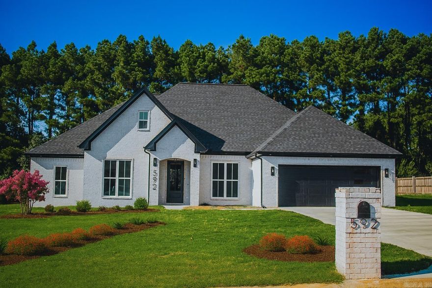 Elegant New Construction in Monticello  Step inside this beautifully crafted 4-bedroom, 2.5-bath residence with an office/flex space. Featuring an open-concept design and timeless finishes, this home blends comfort, elegance, and functionality in every detail.  Features You’ll Love: Chef’s Kitchen – Sleek quartz countertops, upgraded Frigidaire Professional stainless steel appliances, and abundant cabinetry. Gracious Living – Soaring ceilings throughout: 11-foot ceilings in the den and dining room, 10-foot ceilings in the foyer and office, and 9-foot ceilings in the bedrooms. Owner’s Retreat – A spacious master suite with a walk-in closet and spa-inspired en-suite bath. Outdoor Enjoyment – A covered patio perfect for both peaceful evenings and elegant entertaining. Everyday Ease – An insulated 2-car garage door adds comfort and efficiency while providing plenty of storage.  Perfect Location: Situated close to schools, UAM, Baptist Hospital, and local amenities, this home offers both convenience and charm. Monticello also provides two excellent school districts to choose from, making it an ideal place to call home. (photos are virtually staged)
