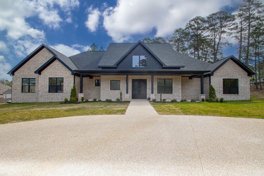 Nestled in the desirable Arlington Park neighborhood of Hot Springs, AR, this stunning Single Family home will be completed in early 2026. Boasting 4 bedrooms, and 3 and 1 half bathrooms, with a private office near the front door, this property offers ample space for comfortable living. The Back porch comes with a real wood burning fireplace and over 800sq ft of covered outdoor patio space for relaxation and entertaining. With modern amenities and stylish finishes, this home is the perfect blend of luxury and functionality. Don't miss your chance to own this exquisite property in a sought-after location.