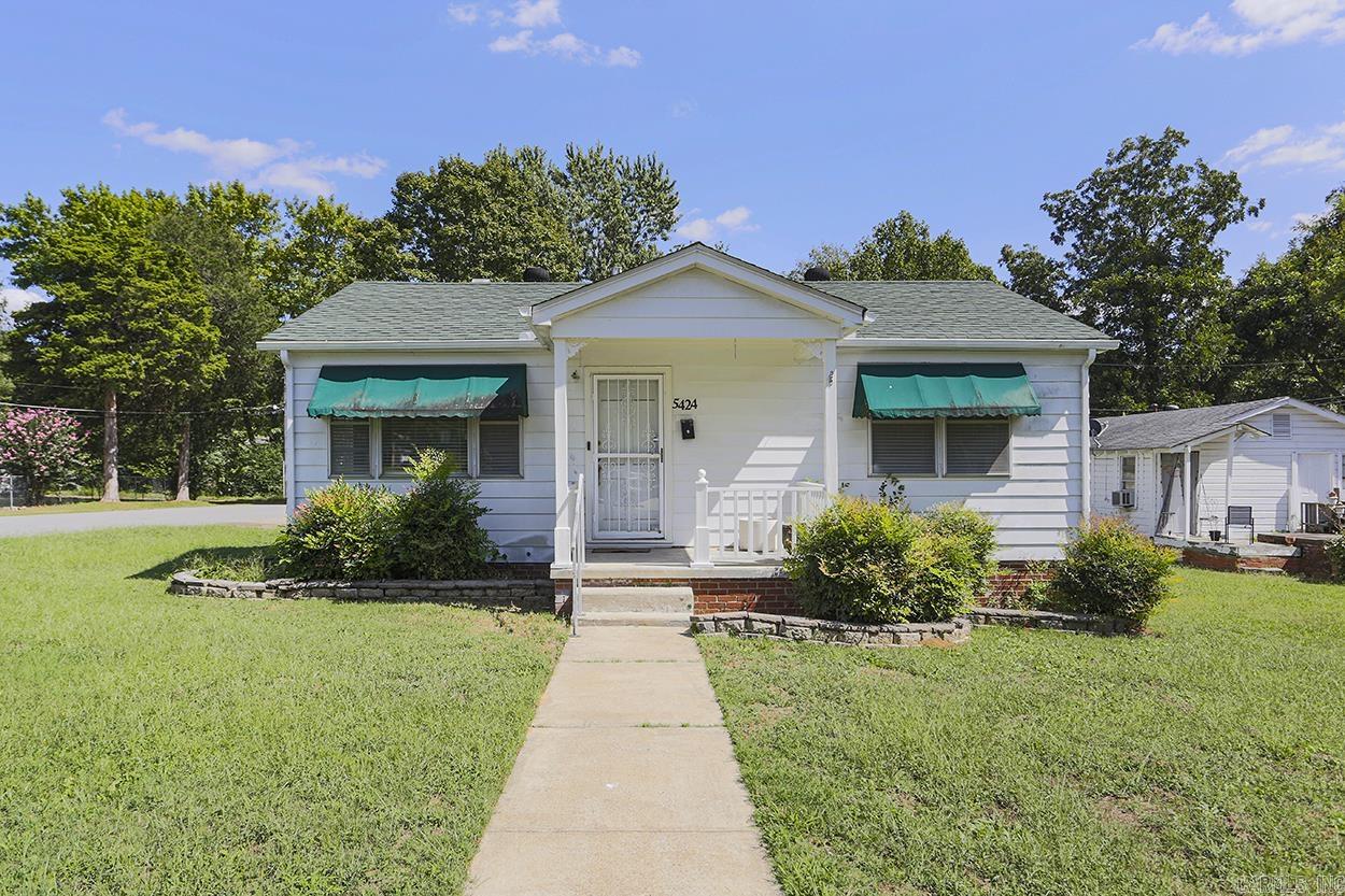 Attention investors! Don't miss this precious bungalow in NLR! The house sits on a corner lot with a side load two car carport. Living room with hardwood flooring. Large eat in kitchen with breakfast bar, gas stove and newer dishwasher. Seperate dining area open to the kitchen. 2 nice sized bedrooms and full bathroom with tub and shower combination. Laundry and bonus area that could be a craft room or storage. 25x35' shop with electricity and garage door opener right off the driveway. Property to be sold as-is but inspections welcome. There is a small area in the back of the property that is in the flood zone. House is not but flood insurance is required. Come see today!