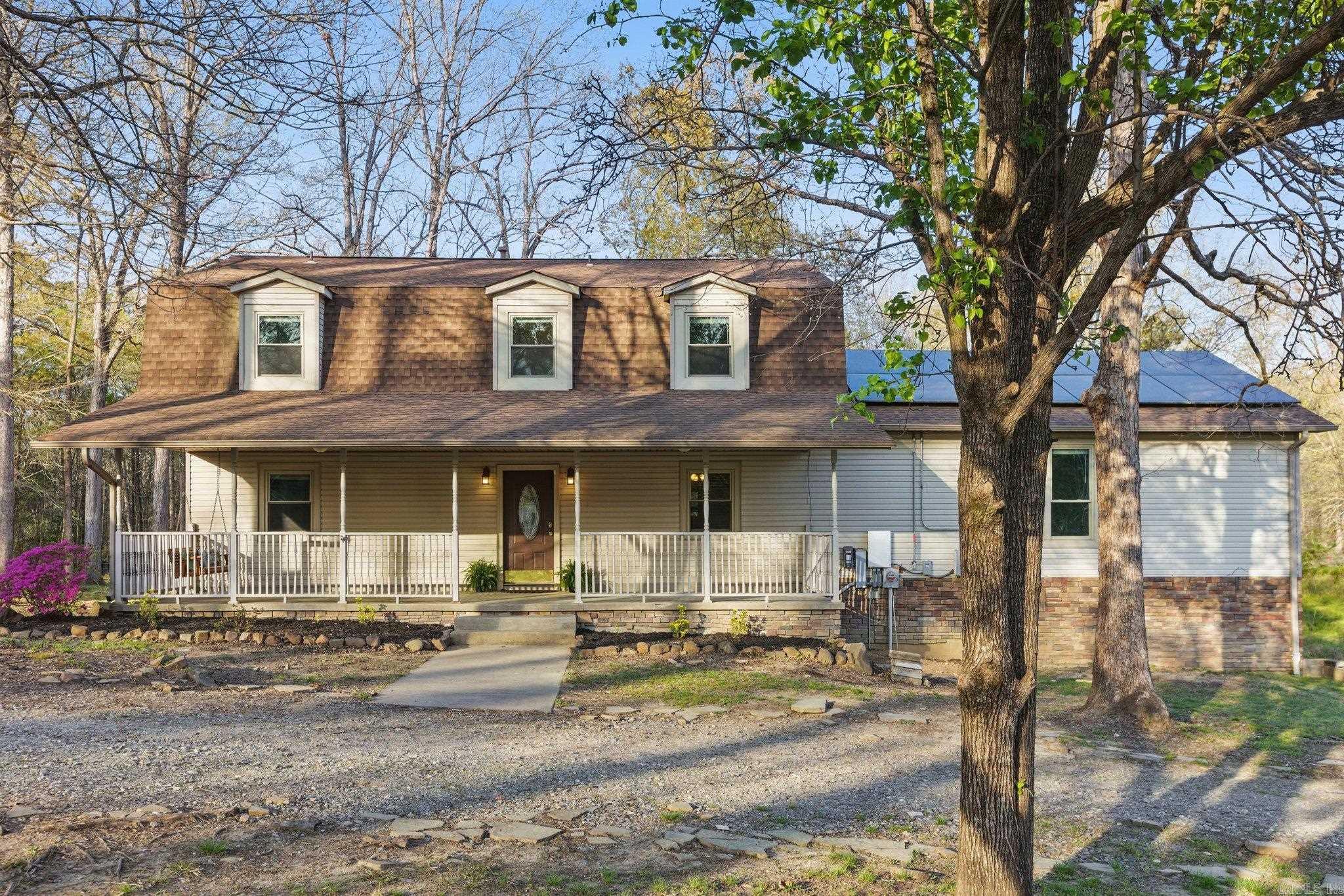 Welcome to this cozy country home, sitting on over an acre of peacefulness. Recently updated with fresh paint and new flooring throughout, this home has a warm, welcoming feel, and move in ready. Enjoy the country breeze from the screened-in porch or kick back on the deck while taking in the beautiful, open views while BBQing with family and friends. Inside, you'll find 4 cozy bedrooms and 2 full bathrooms upstairs, with a convenient half bath for guests downstairs. The spacious family room is perfect for gathering with friends and family! The kitchen and dining area are combined, also great for entertaining. The large laundry sits right off from the kitchen which makes chores a little easier to maintain while multi-tasking. For those quiet moments, relax on the porch swing and enjoy your favorite beverage why soaking in the pleasures of country living. This home offers a perfect mix of space, comfort, and that peaceful country vibe. It’s ready for you to move in and make it your own!