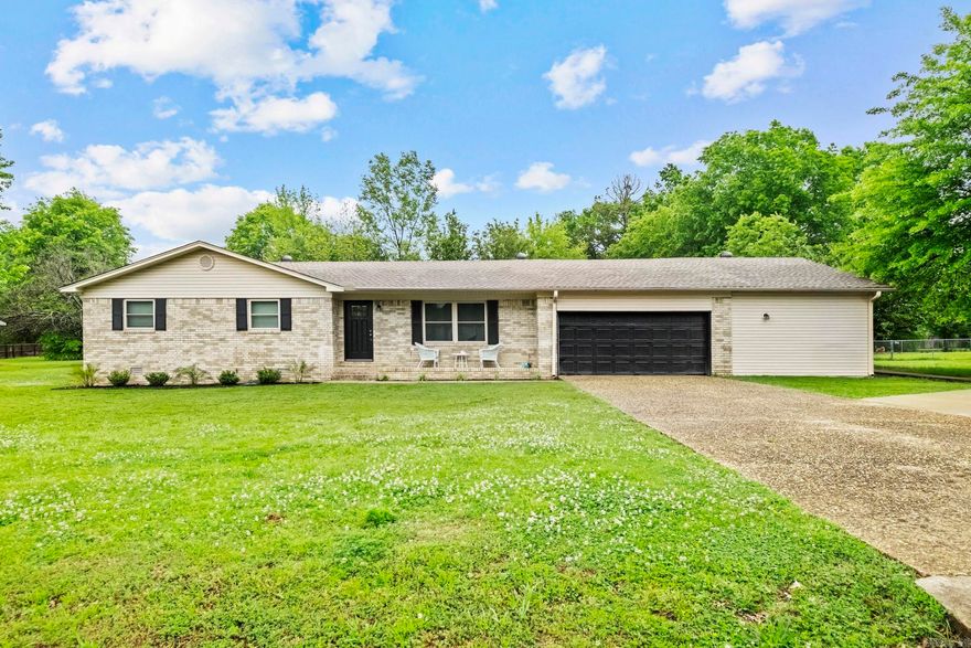 This updated home sitting on a large lot in the heart of Cabot might be the one for you. 4-bedroom 3 bath home has luxury vinyl flooring, granite countertops throughout and 2 kitchens. Spacious living room with an open concept that leads to a large kitchen/dinning combo great for a large family or entertaining.  2 car garage and a shop out back.