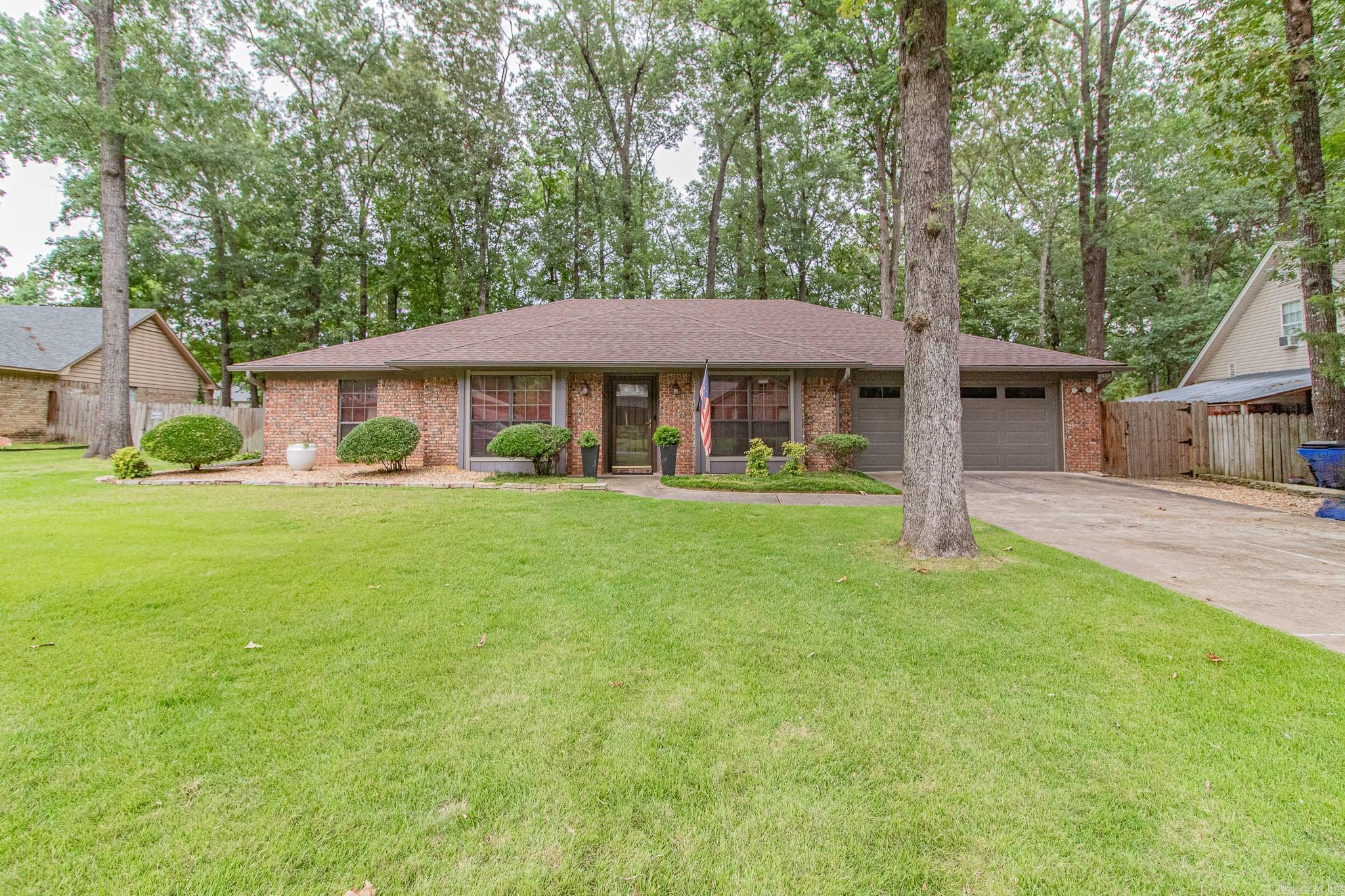 MOVE-IN READY! Nice brick home in Kimberly Manor Addition subdivision with a nice VERSATLE floorplan. FORMAL DINING, HUGE family room w/CATHEDRAL ceilings & WB fp., GENEROUS kitchen w/beautiful sparkly granite overlay, bevel bright-white subway backsplash & updated SLATE APPLIANCES, and a PANTRY to boot as well as a LARGE LAUNDRY ROOM. LVT throughout (tile in wet areas), carpet is only 4 years old. PRIMARY bedroom is HUGE w/direct outside to fenced-in backyard w/beautiful FLAGSTONE patio & built-in FIREPIT/GRILL. Backyard is shaded and perfect for family fun and/or your fur babies. Wired LED lighting illuminates the backyard for after dark entertainment. Don't miss out seeing this home with a MULTI-FUCTIONAL DETACHED BUILDING that can be a M-I-L apartment/a business/great space for a college student or even rent it out for income. It has a kitchenette, full bath, 6-gallon water tank & roll-up door. ALSO CHECK OUT THE Heated/cooled room off the garage that has been used as an office and could make an awesome playroom, PREP-ROOM, storage or whatever. XTRA PARKING for your boat/RV/vehicles. Direct access to the shaded walking-path. CLOSE TO SHOPPING/eateries. See agent remarks!