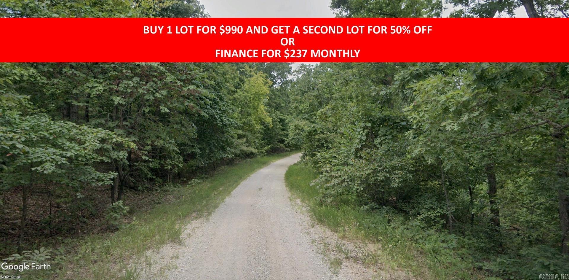 Buy one lot and get 50% off an additional lot! Owner-finance for easy terms. Cash buyers can pay by debit or credit card as well. Nice lot to develop or hold for future value. Public water and electric are available to run to property and will need septic. Owner/agent. No mobiles allowed. 600-2500 minimum build size on any other type of home, depending on subdivision. Finance is $100 down and 10 months at $99 and closing costs are included. Lots marked with red banner are part of promotion. No limit on lots. Buyer responsible for any/all taxes and lots sold "as-is". Quit claim deed conveys. Parcel ID# 200-13784-000
