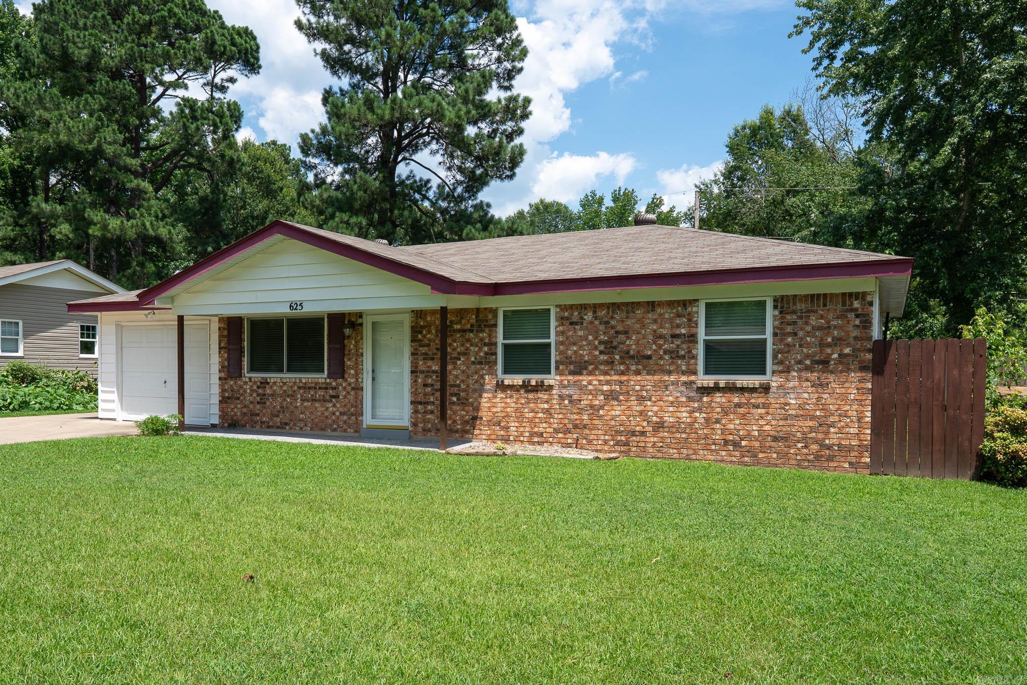 Stay cool this summer in this charming 3-bedroom, 1.5-bath home featuring a newer Trane HVAC system! Step inside to find freshly painted walls, updated flooring, and modern appliances that make everyday living a breeze. The kitchen boasts refinished cabinets, a fun accent wall, and plenty of character. Enjoy natural light from the newer windows and relax under the covered patio overlooking the spacious backyard perfect for entertaining, pets, or play. This cozy home blends comfort, style, and practicality in a great location. Come see it for yourself!