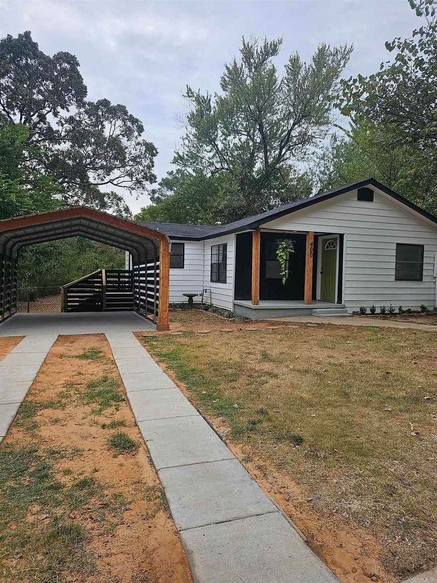 You have to see it to believe it!  This home has been completely renovated!  All new electrical, plumbing, roof, HVAC, hot water heater, all new paint, flooring appliances, cabinets. butcher block countertops, driveway, exterior doors & decking! Adorable home centrally located near shopping, interstate & schools. Call today....you don't want to miss it! See Agent Remarks