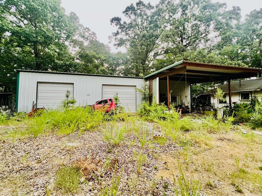 No Value on home. 9 wooded acres with Hwy 71 frontage. Large shop with lift.  Electric, well, septic on property. Mountain view to the SW.  Owner to remove items from shop prior to closing. Property sold "AS IS". Well and septic were in normal working order when home was occupied.