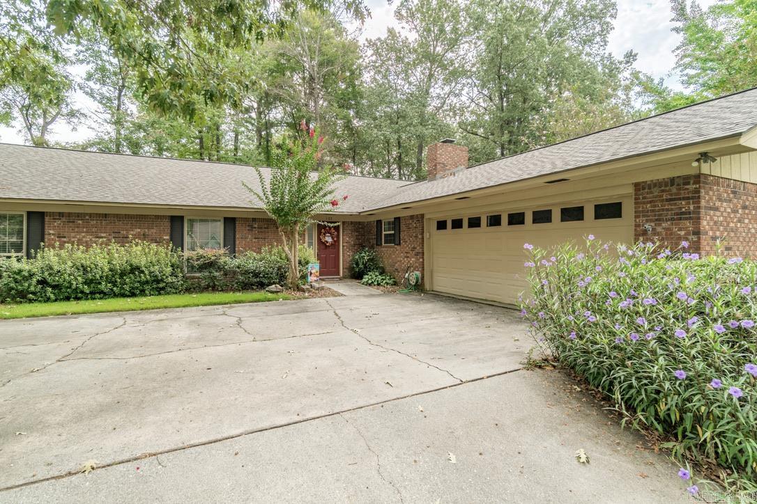 Welcome to 107 Ridgewood Road in Prescott, Arkansas ā where timeless charm meets modern updates! This stunning 4-bedroom, 3-bath brick home offers 2,635 sq. ft. of single-level living on a spacious corner lot in one of Prescottās most sought-after neighborhoods. Inside, youāll find generously sized bedrooms with walk-in closets, a separate dining room for special gatherings, and a warm, inviting eat-in kitchen that flows beautifully for everyday living. Recent upgrades include a brand-new roof (2023), new carpet in all four bedrooms (2024), two new hot water tanks, and energy-efficient insulated windows. Whether youāre hosting friends or enjoying quiet evenings, this home was made for entertainingārelax on the screened-in porch overlooking the beautifully landscaped .70-acre lot or gather in style indoors. The 1,232 sq. ft. shop with attic storage is perfect for hobbies, projects, or extra space, while the 2-car garage adds convenience. With its prime location, thoughtful updates, and spaces designed for comfort and connection, this Prescott gem is move-in ready and waiting for you to call it home.