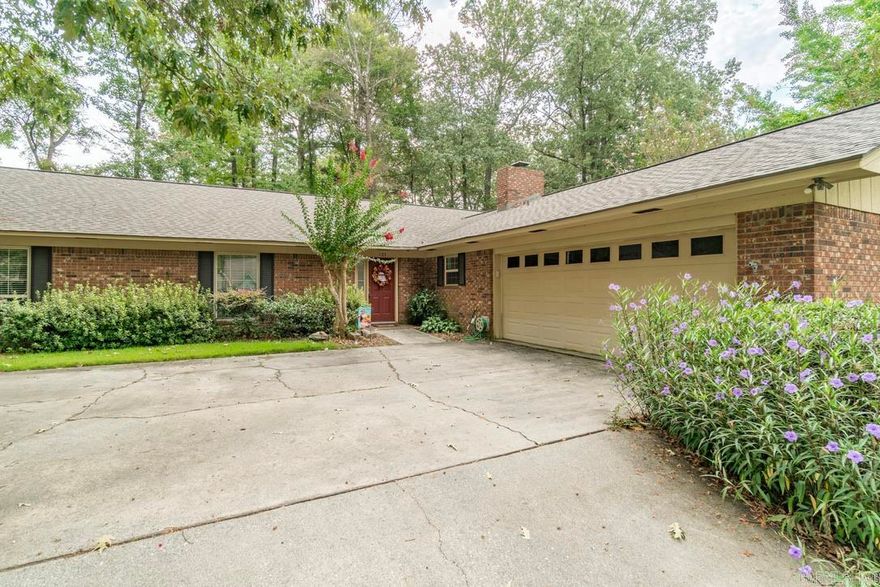 Welcome to 107 Ridgewood Road in Prescott, Arkansas — where timeless charm meets modern updates! This stunning 4-bedroom, 3-bath brick home offers 2,635 sq. ft. of single-level living on a spacious corner lot in one of Prescott’s most sought-after neighborhoods.  Inside, you’ll find generously sized bedrooms with walk-in closets, a separate dining room for special gatherings, and a warm, inviting eat-in kitchen that flows beautifully for everyday living. Recent upgrades include a brand-new roof (2023), new carpet in all four bedrooms (2024), two new hot water tanks, and energy-efficient insulated windows.  Whether you’re hosting friends or enjoying quiet evenings, this home was made for entertaining—relax on the screened-in porch overlooking the beautifully landscaped .70-acre lot or gather in style indoors. The 1,232 sq. ft. shop with attic storage is perfect for hobbies, projects, or extra space, while the 2-car garage adds convenience.  With its prime location, thoughtful updates, and spaces designed for comfort and connection, this Prescott gem is move-in ready and waiting for you to call it home.