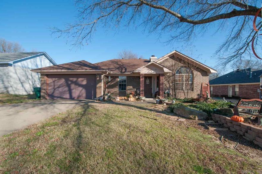 This home won’t be on market long.  Beautiful 3 bedrooms 2 bath home that's  been kept up to date & is very neat.  Family room has wood burning fireplace, hardwood floor, vaulted ceiling, built in display landing & an open formal dining area. Kitchen features a built in pantry & eat in kitchen area.   Master bedroom has crown molding, 2 separate closets and master bath features and an arched entry.  Backyard is large with oversized decking, pavilion and fully fenced.  Front & back yard has extra landscaping