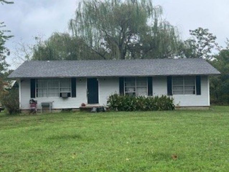 Fixer-Upper on Two Acres Looking for a country home with space to breathe and no close neighbors? This property sits on two acres and is ready for your vision. The home does need some repairs to the flooring and subfloor but is priced accordingly. Currently tenant-occupied, with tenants in the process of moving out.  Whether you’re looking for your next project or a home with potential that just needs a little work, this could be the opportunity you’ve been waiting for. Call today to schedule a showing and see the possibilities for yourself!