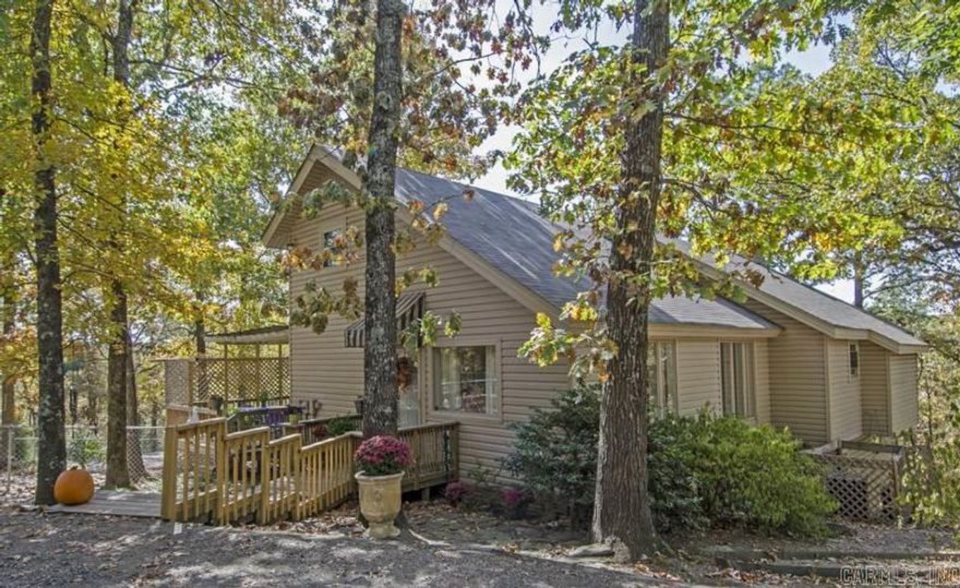 In the woods in WLR off Kanis over an acre wooded and very private. 3 Bedroom and 2 bath on main level with loft that could be 4th bedroom or office. Den with fireplace. Green house. Private dead end street.  See agent remarks for legal description.