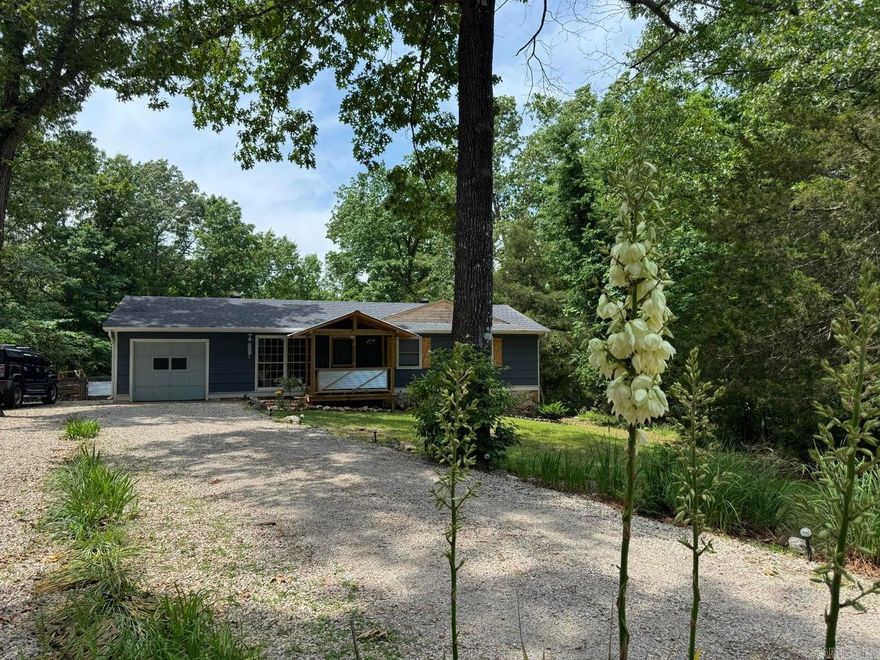 Tucked away at the end of a quiet cul-de-sac, this secluded 3-bedroom, 2-bath home offers privacy, comfort, and seasonal lake views in a peaceful setting. Enjoy relaxing mornings and evenings on the inviting front porch complete with a ceiling fan, or entertain guests on the spacious back deck overlooking the fenced backyard.Inside, you'll find numerous recent updates designed for modern living, including a new roof, new HVAC system, and updated appliances. The kitchen features a new gas range and oven with built-in air fryer option, along with a new dishwasher. A convenient GE all-in-one washer/dryer adds even more functionality and efficiency to the home. With its quiet location and welcoming outdoor spaces, this home is the perfect blend of comfort, convenience, and privacy.