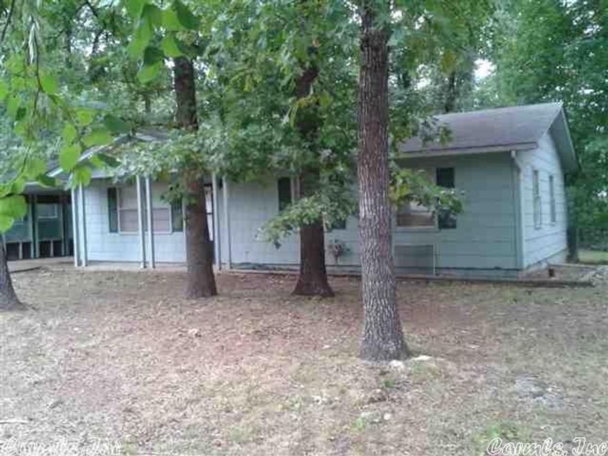 Fenced yard. AVAILABLE Oct 17th!  This three bedroom home has fresh paint and newer carpet.  Carport has screened windows so could also be used as a patio.  Stove and fridge included.  Within blocks of Lake Sequoyah beach. NO SMOKING No Pets.