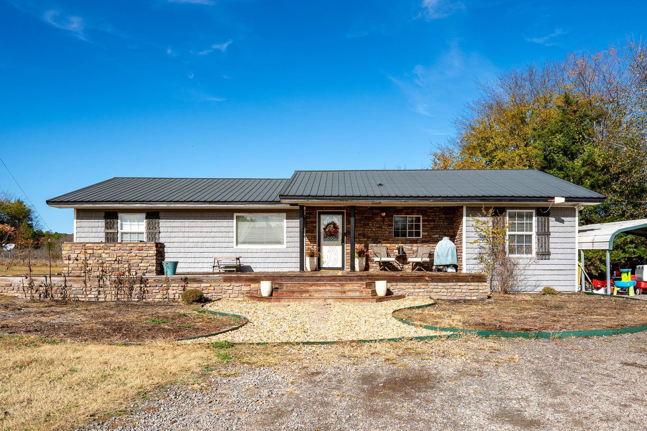 Imagine coming home to this peaceful and quiet country home located within minutes to Conway, Perryville, or Morrilton. Upon entering, you will notice all the updates and with the open floor plan, you will have lots of room to entertain in this beautiful home. If you need an office, an additional living area or game, this home has a large room for any of those. This home comes with an amazing 4 acres with large 30X50 shop. An additional 2.5 acres can also be purchases. If you have been looking for a beautiful home and few acres in a quiet location, this is a must see. SEE AGENT REMARKS.