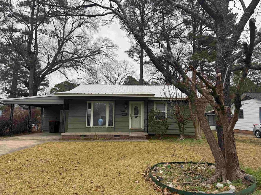 THIS IS THE ONE!!!  Cute bungalow style home, with all the cuteness inside! New Paint, New lights, wood flooring, New HVAC,  metal roof, and 2 storage buildings in a beautiful fenced in back yard!! Nice large laundry room in carport with more storage!  YOU WON'T WANT TO MISS OUT! Call me today to take a peak!!