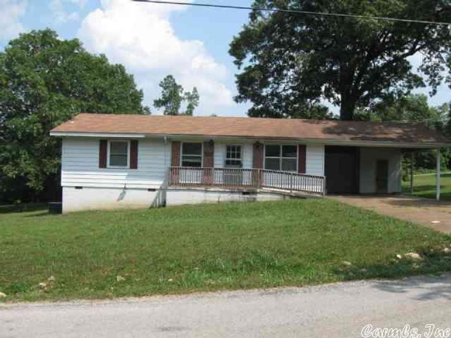 This 3 bedroom 2 bath home is in a great location - in sight of the elementary school!  Level lot and less than a mile to the 4-lane highway.  Laminate flooring throughout.  1 car carport with storage. Covered back porch. Looking for a long-term renter. (applications required for every adult 18+)