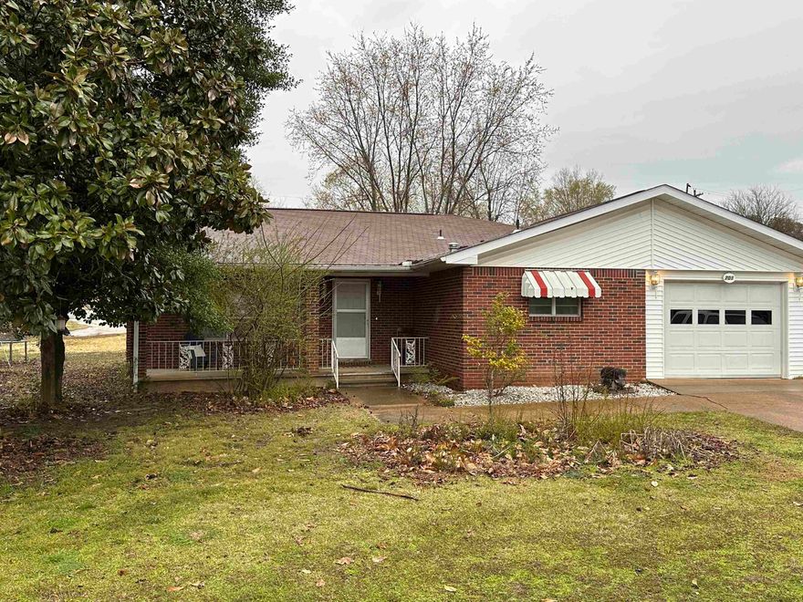 Three bedroom, two bath with one car garage in a quiet neighborhood in the heart of Mtn. Home. The original family who built the home in the late 1960's still owns the property. This home has been well maintained with a new HVAC in the early 2022 and a new hot water heater in the early 2019 and a roof that is approximately 10 years old. The large living room offers a natural gas fireplace and plenty of natural light, it opens into the large dining room that is right off the kitchen. The bedrooms provide ample space with plenty of natural light. The backyard is fenced in with an outbuilding and the side yard has mature trees that offer shade with room for relaxation and play. All appliances will convey. $179,900